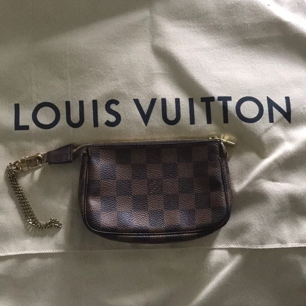 LOUIS Vuitton wristlet